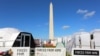 The "Forced From Home" exhibit on the National Mall in Washington, D.C., depicts the life of more than 65 million displaced people worldwide. (B. Allen/VOA).