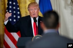President Donald Trump speaks during a news conference with Swedish Prime Minister Stefan Lofven in the East Room of the White House, March 6, 2018, in Washington.