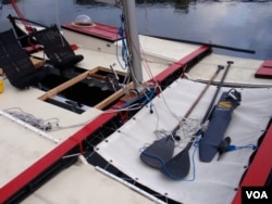 Team Puffin has alternate methods of propulsion for their Wharram Tiki 21 catamaran. (Tom Banse/VOA)