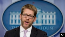 FILE - White House press secretary Jay Carney speaks during his daily news briefing at the White House in Washington, Jan. 22, 2014.