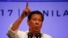 Philippines President Rodrigo Duterte gestures while addressing the media following the conclusion of the 30th ASEAN Leaders' Summit in Manila, Philippines, April 29, 2017.