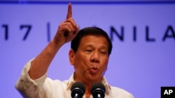 Philippines President Rodrigo Duterte gestures while addressing the media following the conclusion of the 30th ASEAN Leaders' Summit in Manila, Philippines, April 29, 2017.