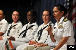 Cmdr. Shanti Sethi, commanding officer of the USS Decatur, answers questions from female students during an event to commemorate Women's History Month in Chennai, India, for a port visit in 2011. (U.S. Navy/Jennifer A. Villalovos)