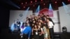 Taking a group selfie are 30 of the accomplished Vietnamese entrepreneurs under 30 years old highlighted by Forbes. (Lien Hoang for VOA News)