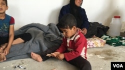 Child displaced by fighting in his village southeast of Mosul. 14 Apr 2016, Makhmour, Iraq (S. Behn / VOA)