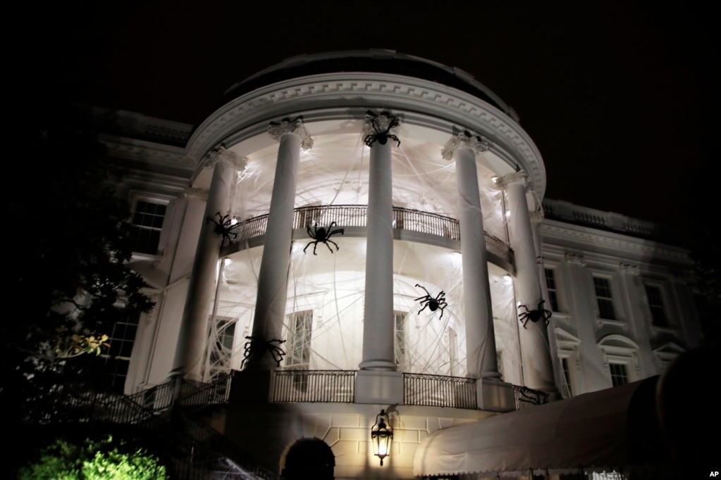 The White House in Washington, is decorated with spiders and web for Halloween, Oct. 28, 2017.