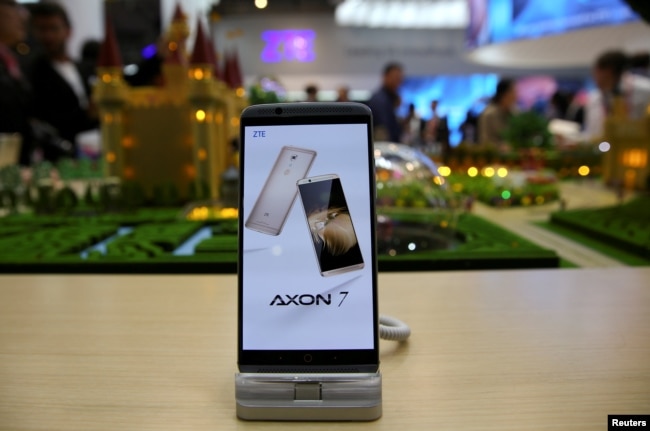 A ZTE Axon7 device is displayed at company's booth during Mobile World Congress in Barcelona, Spain, Feb. 27, 2017.