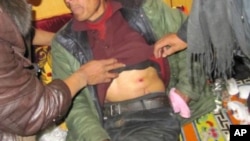 Picture shows a Tibetan wounded by gunfire in Draggo