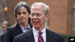 FILE - Dana Boente, then-first assistant U.S. attorney for the Eastern District of Virginia, leaves federal court in Alexandria, Virginia, Jan. 26, 2012.