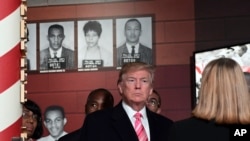 President Donald Trump gets a tour of the new Mississippi Civil Rights Museum in Jackson, Miss., Dec. 9, 2017.