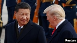 တရုတ်သမ္မတ Xi Jinping နဲ့ အမေရိကန်သမ္မတ Donald Trump။ 