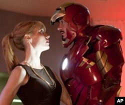 Pepper Potts (Gwyneth Paltrow), and Tony Stark (Robert Downey Jr.) in “Iron Man 2.” © 2010 MVLFFLLC. TM & © 2010 Marvel. All Rights Reserved.