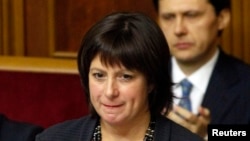 FILE - Ukrainian Finance Minister Natalie Jaresko says her country's economy shrank as much as 10 percent in the first quarter. 