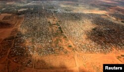 FILE - An aerial view shows makeshift shelters at the Dagahaley camp in Dadaab, near the Kenya-Somalia border in Garissa County, Kenya.