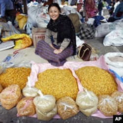 A woman waits for customers at a vegetable market in Bhutan's capital, Thimpu (File)