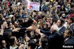 Democratic U.S. presidential candidate Bernie Sanders greets supporters at a campaign rally in Philadelphia, Penn., April 6, 2016.