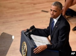 President Barack Obama speaks an interfaith memorial service for the fallen police officers and members of the Dallas community, July 12, 2016, at the Morton H. Meyerson Symphony Center in Dallas.