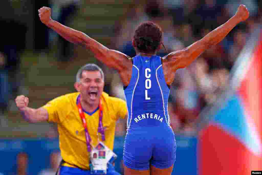 Colombia's Jackeline Renteria Castillo celebrates after defeating Ukraine's Tetyana Lazareva for the bronze medal in Women's 55kg Freestyle wrestling.