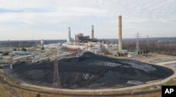 A large field of coal is stored on the property of Dominon Energy's Chesterfield Power station in Chester, Virginia, Dec. 4, 2017.
