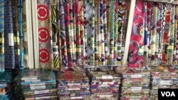 FILE - Foreign textile fabrics and materials are seen in a Nigerian shop, Dec. 5, 2012. (I. Kure/VOA)