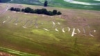 "We the People," the beginning of the preamble of the U.S. Constitution, is seen cut into a wheat field on the farm of Jack Coleman in Ronks, Pa., June 26, 2003. (AP Photo/Chris Gardner)