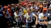 Wife: Venezuela's Jailed Lopez Well, Urges More Protests