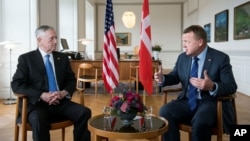Danish Prime Minister Lars Loekke Rasmussen (R) gestures during a meeting with United States Defense Minister, former General James Mattis (L) in the prime minister's office at Christiansborg Castle in Copenhagen, Denmark, May 9, 2017.