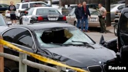 The vehicle of the alleged shooter is pictured at one of crime scenes after a series of drive-by shootings in the Isla Vista section of Santa Barbara May 24, 2014.