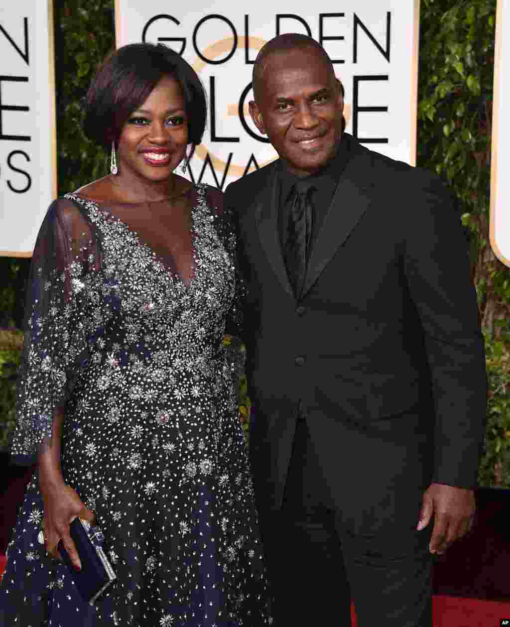 Viola Davis, left, and Julius Tennon arrive at the 73rd annual Golden Globe Awards on Jan. 10, 2016, at the Beverly Hilton Hotel in Beverly Hills, Calif. 