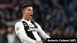 Jogador Cristiano Ronaldo festeja um dos golos marcados pela Juventus contra o Atlético de Madrid a 12 Março 2019