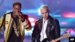 Fetty Wap, left, and Pete Wentz perform at the MTV Movie Awards at the Nokia Theater, on April 12, 2015, in Los Angeles.