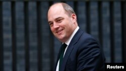 FILE - Ben Wallace arrives for a meeting at 10 Downing Street, in Westminster, London, Britain.