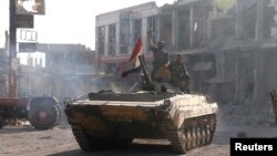 Pasukan Suriah merangsek ke pusat kota Qusair (5/6) setelah menguasai kota strategis itu dengan bantuan kelompak Hizbullah dari Lebanon. 
