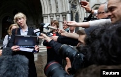 Gwendolen Morgan, the lawyer for David Miranda, makes a statement to members of the media outside the High Court in London, Aug. 22, 2013.