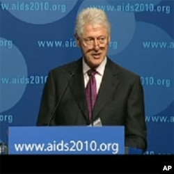 President Clinton speaking at the 18th International AIDS Conference in Vienna.