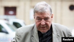 Cardinal George Pell arrives at the County Court in Melbourne, Australia, Feb. 26, 2019. 