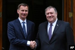 İngiltere ve ABD Dışişleri Bakanları Jeremy Hunt ve Mike Pompeo (Arşiv)