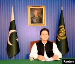 Pakistan's Prime Minister Imran Khan speaks to the nation in his first televised address in Islamabad, Pakistan, Aug. 19, 2018.
