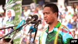 FILE - Incumbent Zambian President Edgar Lungu addresses tens of thousands of supporters on May 21, 2016, at the Heroes Stadium in Lusaka as he launches his re-election campaign.