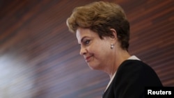 FILE - Brazil President Dilma Rousseff arrives to speak to members of the media during a visit at Google headquarters in Mountain View, California, July 1, 2015. 