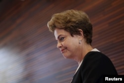 Brazil President Dilma Rousseff arrives to speak to members of the media during a visit at Google headquarters in Mountain View, California, July 1, 2015.