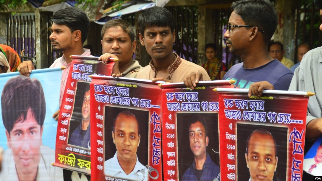 FILE - Families and friends of the victims of enforced disappearance in Bangladesh demonstrate on the streets of Dhaka, Dec. 10, 2021, hours after the U.S. imposed human rights-related sanctions on Bangladesh's paramilitary force.