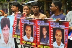 Families and friends of the victims of enforced disappearance in Bangladesh demonstrating on the streets of Dhaka on December 10, 2021, hours after the US imposed human rights-related sanctions on Bangladesh's paramilitary force Rapid Action Battalion [RAB]. RAB is accused of a serious level of human rights violations, including the enforced disappearance of people. (Photo by Tazul Islam)