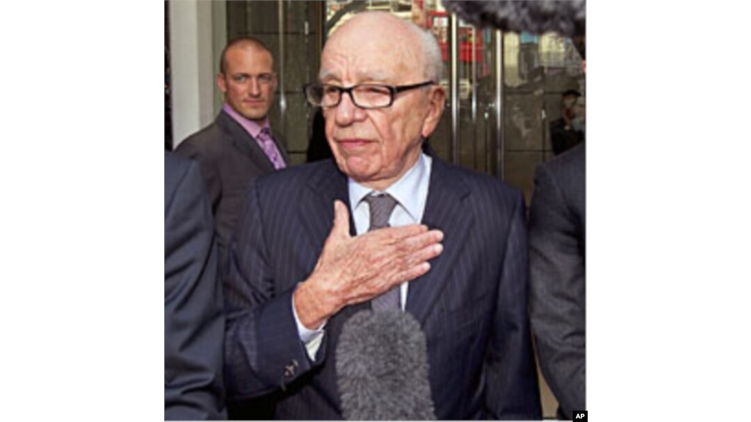 File photo shows News Corp Chief Executive Rupert Murdoch speaking outside a hotel where he met the family of murdered teenager Milly Dowler in central London, July 15, 2011