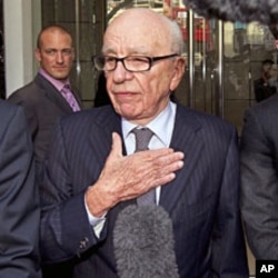 File photo shows News Corp Chief Executive Rupert Murdoch speaking outside a hotel where he met the family of murdered teenager Milly Dowler in central London, July 15, 2011