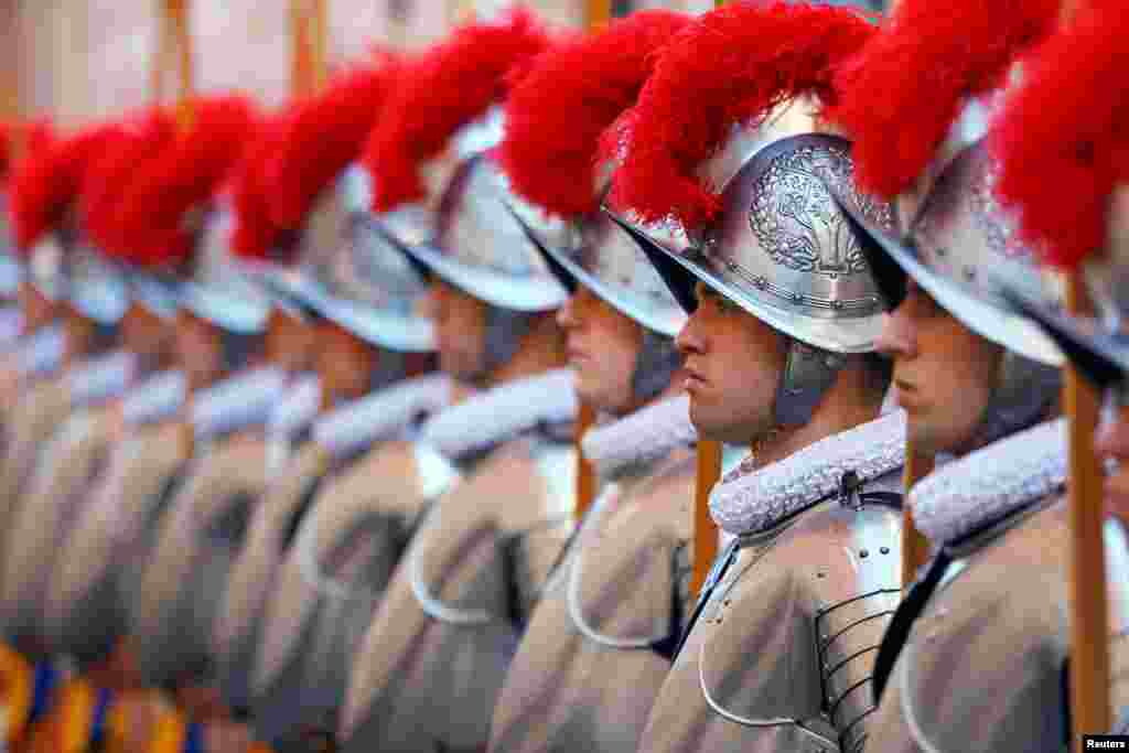 New recruits of the Vatican&#39;s elite Swiss Guard stand in the courtyard prior to a swearing-in ceremony at the Vatican.