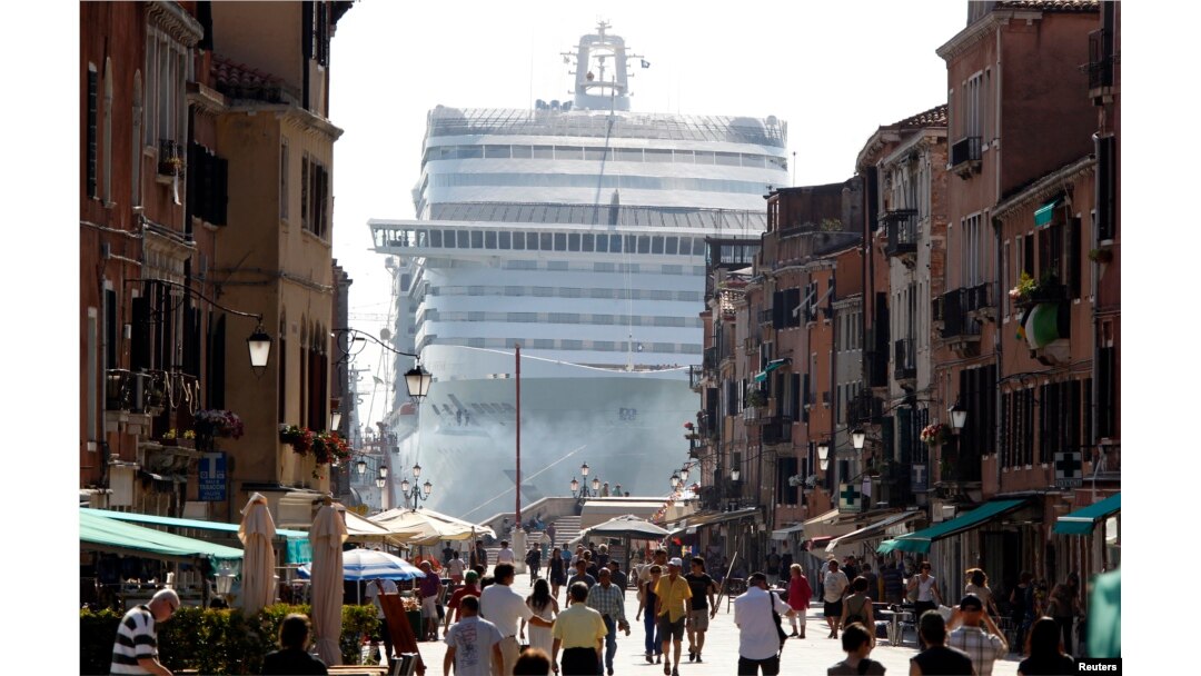 FILE - The MSC Divina cruise ship is seen in Venice lagoon, June 16, 2012.