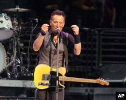 FILE - Bruce Springsteen performs in concert with the E Street Band during "The River Tour 2016" in Philadelphia, Feb. 12, 2016. Springsteen has canceled his concert in North Carolina, citing the state's new law blocking anti-discrimination rules as the reason.