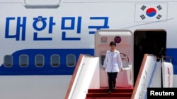 South Korean President Park Geun-hye arrives at the airport in Beijing, June 27, 2013.