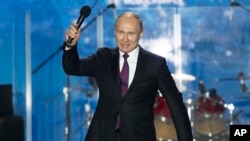 Президент Путін кульмінацію своєї виборчої кампанії влаштував у Криму. 14 березня 2018 р.